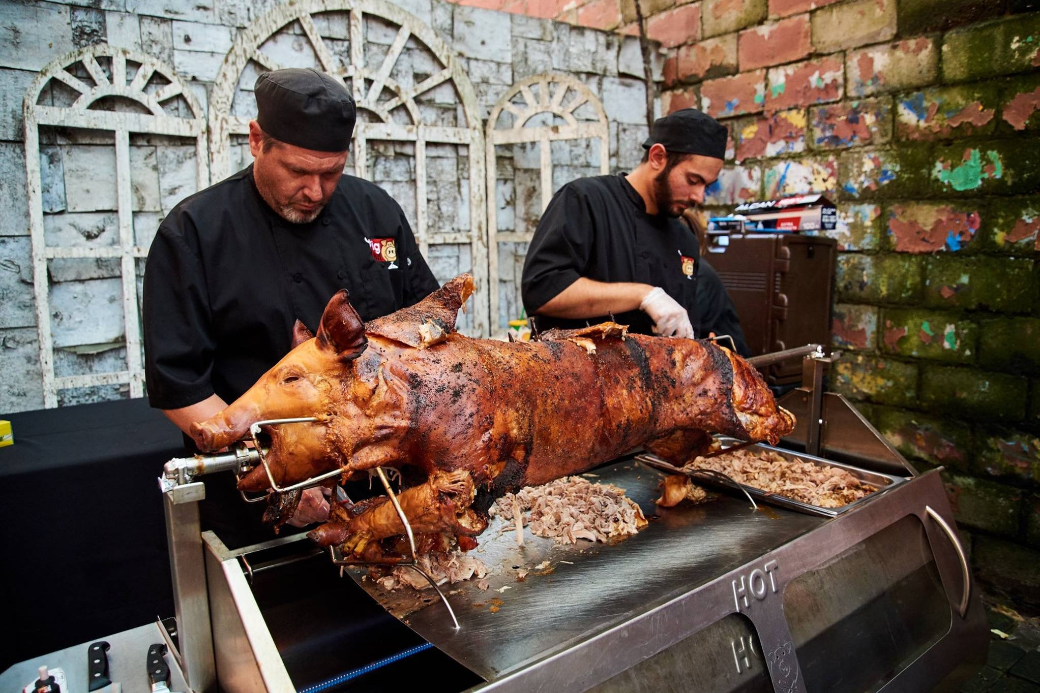 The PigOut Propane Roaster in use at an outdoor event